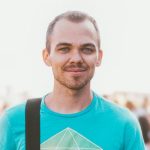 man holding black bag